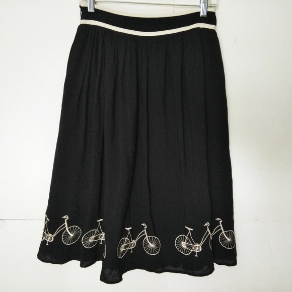 Tulip B pleated skirt with bicycles embroidered - Picture 2 of 7